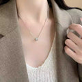 # Product Description This elegant ring necklace combines contemporary design with timeless appeal.