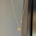 Sun Necklace Radiate celestial elegance with this striking sun necklace, a timeless piece that captures the warmth and vitality of solar symbolism
